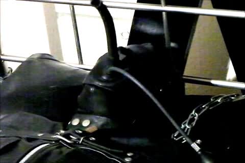 Wearing A Rubber Cat Suit Inside A Leather Body Bag handcuffed To The bed, Hooded And Gagged, Then Teased For Two Hours Until that guy cum.